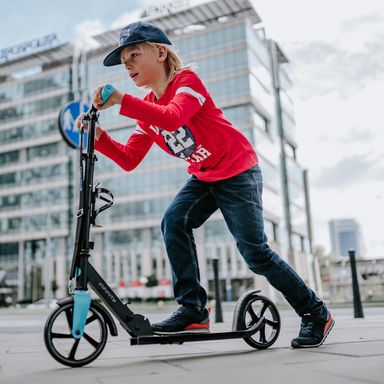 Going to school on a scooter!